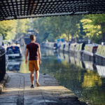 Young man on canal path, Promarine